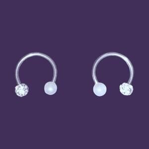 Pair of Silver Rings with Crystal and Pearl Ends